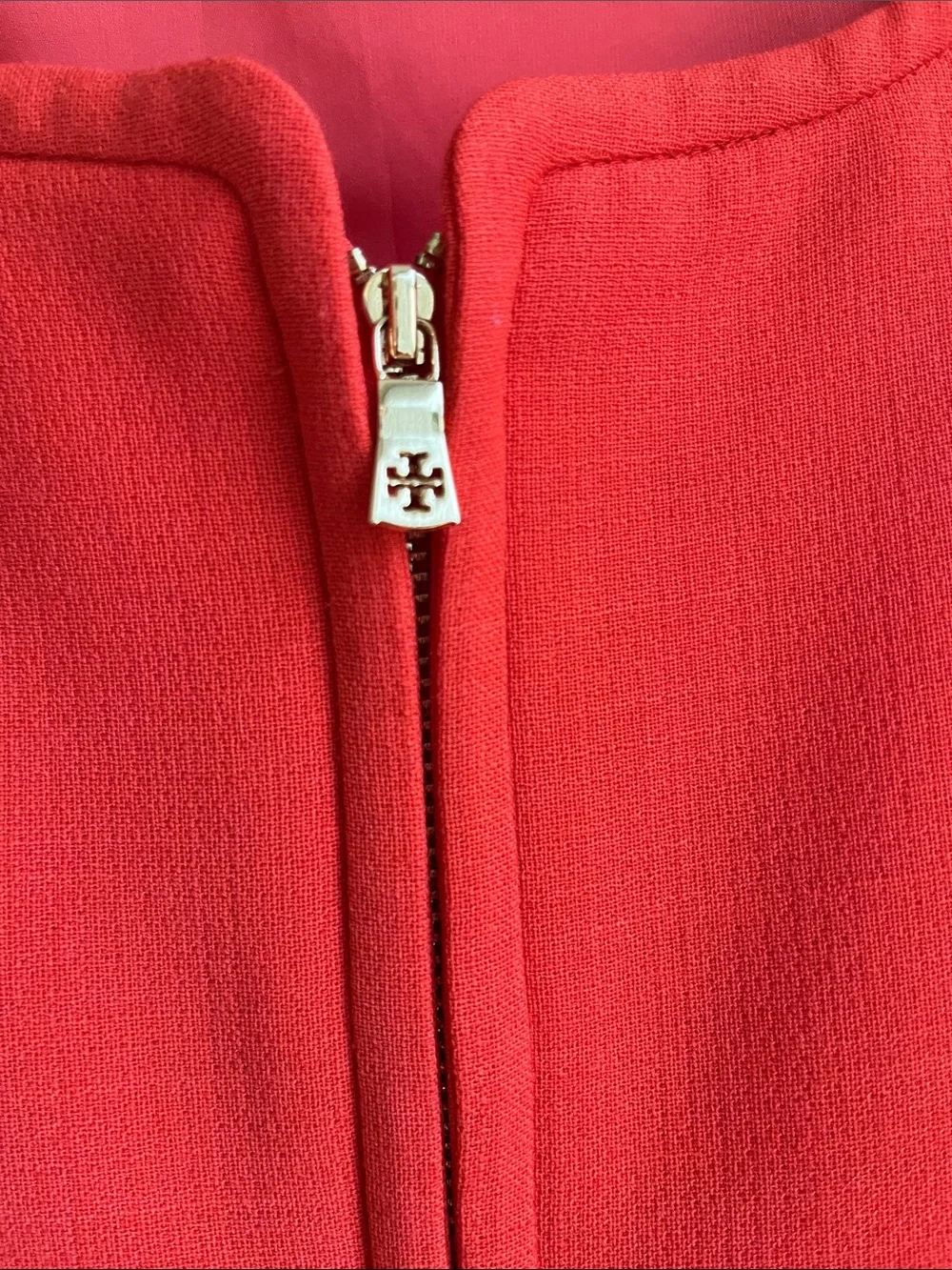 Tory Burch Bright Orange Sleeveless Zip-Front Midi Dress with pockets.